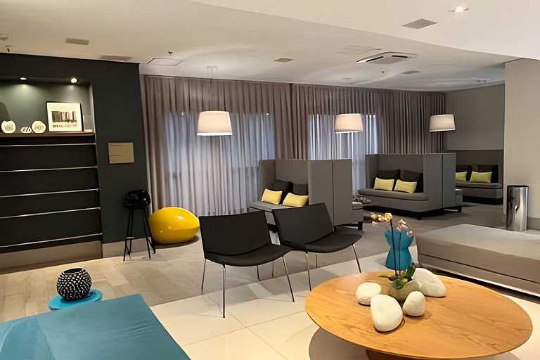 Suíte em flat no Gonzaga Stay Helbor