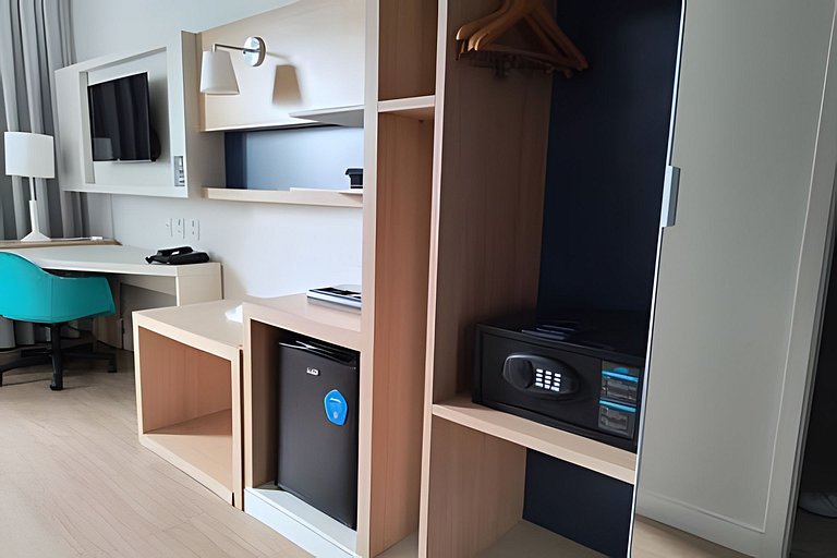 Suíte em flat no Gonzaga Stay Helbor