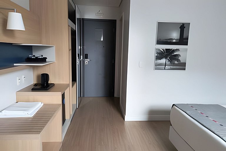 Suíte em flat no Gonzaga Stay Helbor